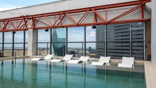 Downtown Dallas Apartment | 16th FL Bold CozySuites with pool, gym #4