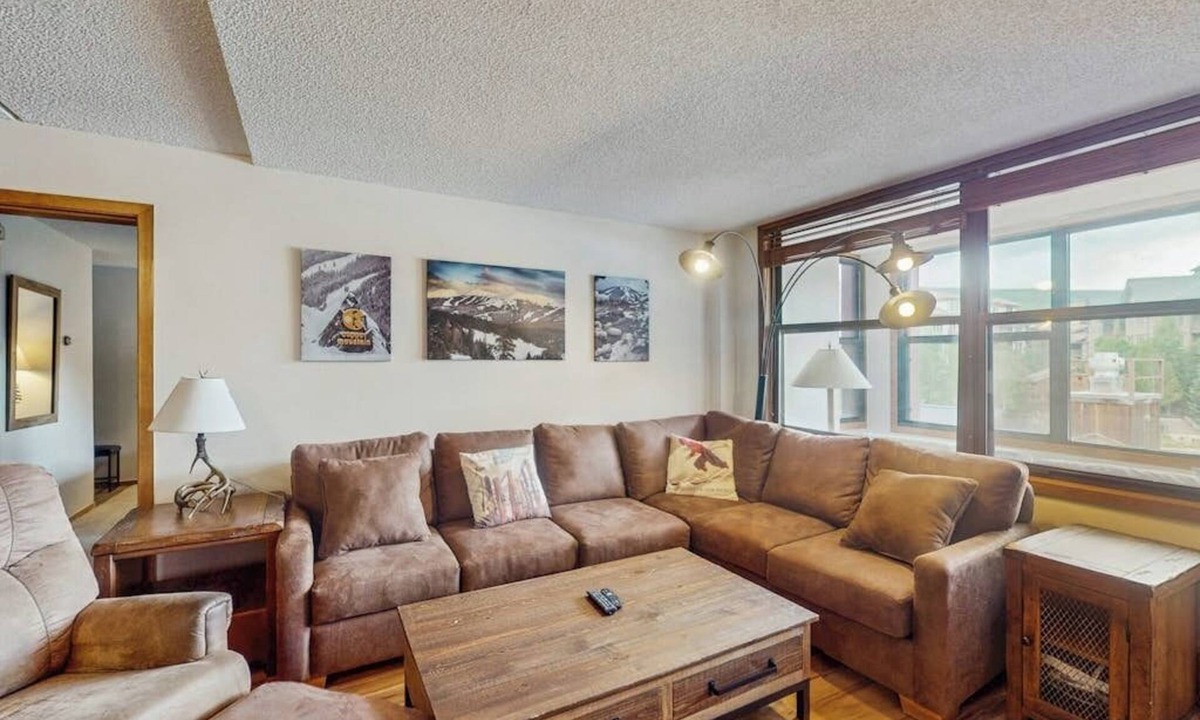 Copper Mountain Village House | Charming condo with a private sunroom, kitchen, & hot tub - walk to lift