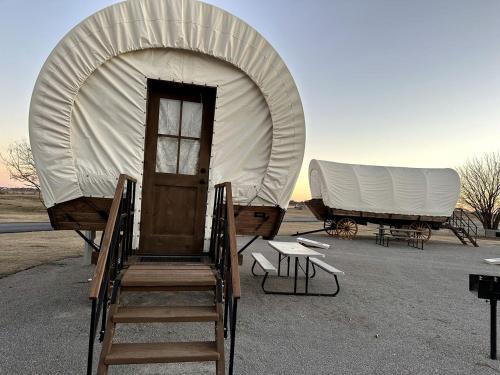 South Oklahoma City House | Cozy Conestoga Covered Wagon for 6 on Oklahoma Farm, for Memorable Glamping Vacations