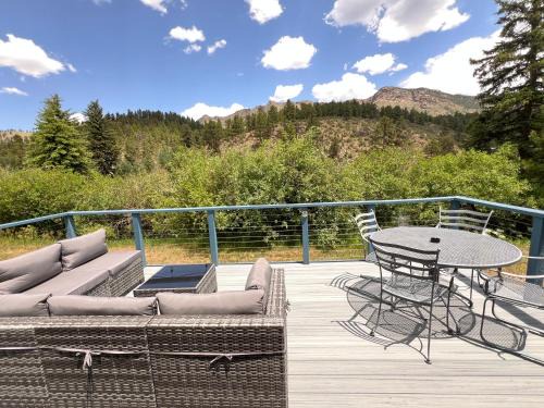 Bailey House | Cozy Riverfront Cabin with Fireplace & Deck