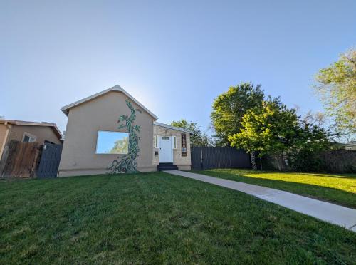 Elyria Swansea Villa | Denver Oasis 5BR Home with Hot Tub, Sleeps 16