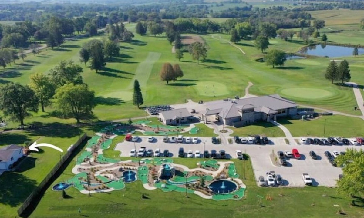 Altoona House | Enjoy golf course views with hot tub and fire pit. Three bedrooms, sleeps seven.