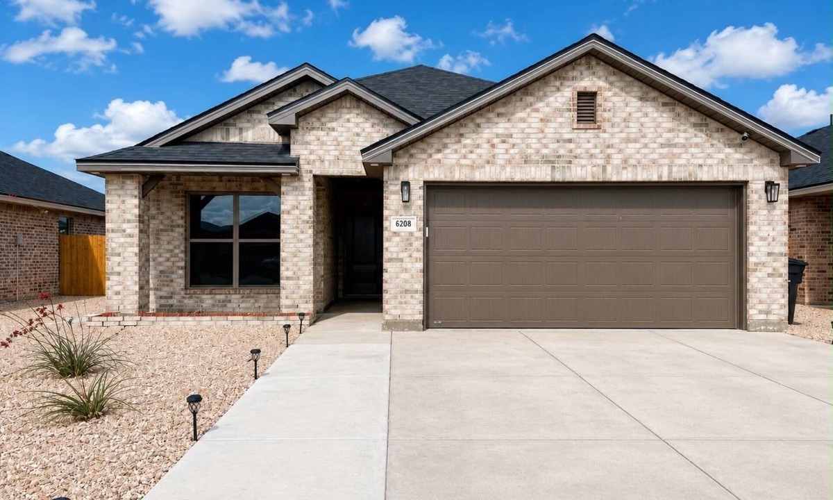 Midland House | House with a 2-car garage