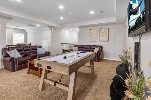 Barker House | HTown Getaway Air Hockey Gym Yard BBQ Swing Set