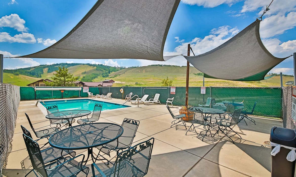 Silvercreek Condo | Inviting condo with outdoor heated pool, private hot tub, fireplace & W/D access