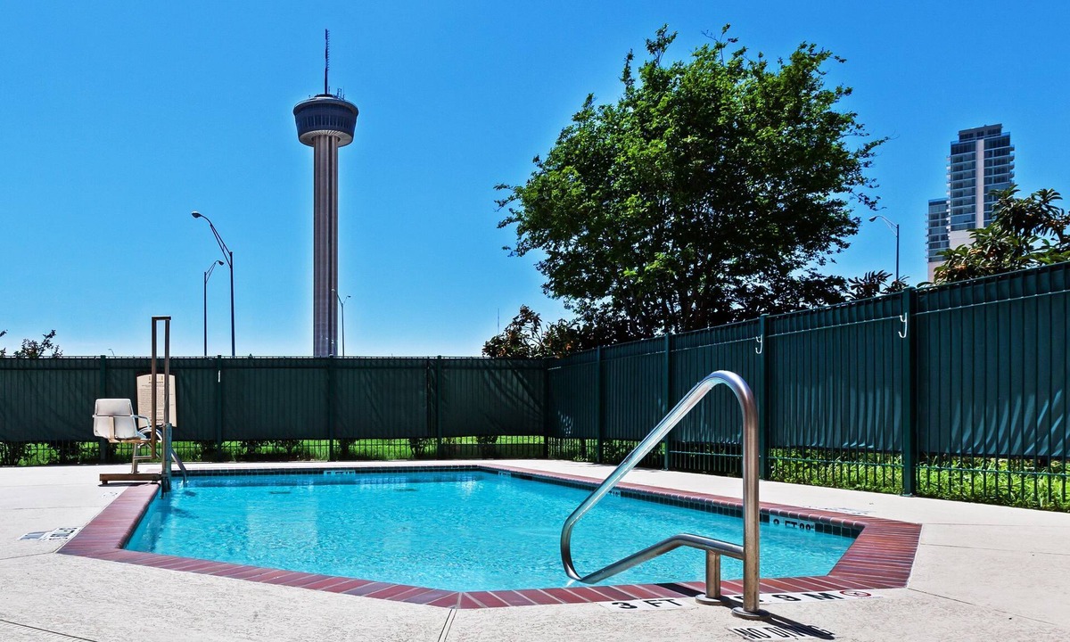 Near East Side Condo | Only 3 Blocks from Gonzalez Convention Center | Outdoor Pool + Roll-in Shower