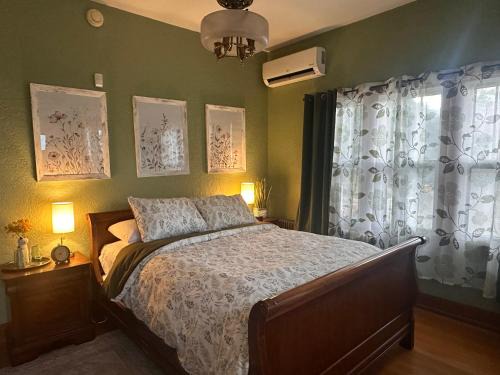 Silver Hill Apartment | Private Gated Garden Suite in Historic Home, walk to UNM Football and Basketball, UNM and Pres Hospitals