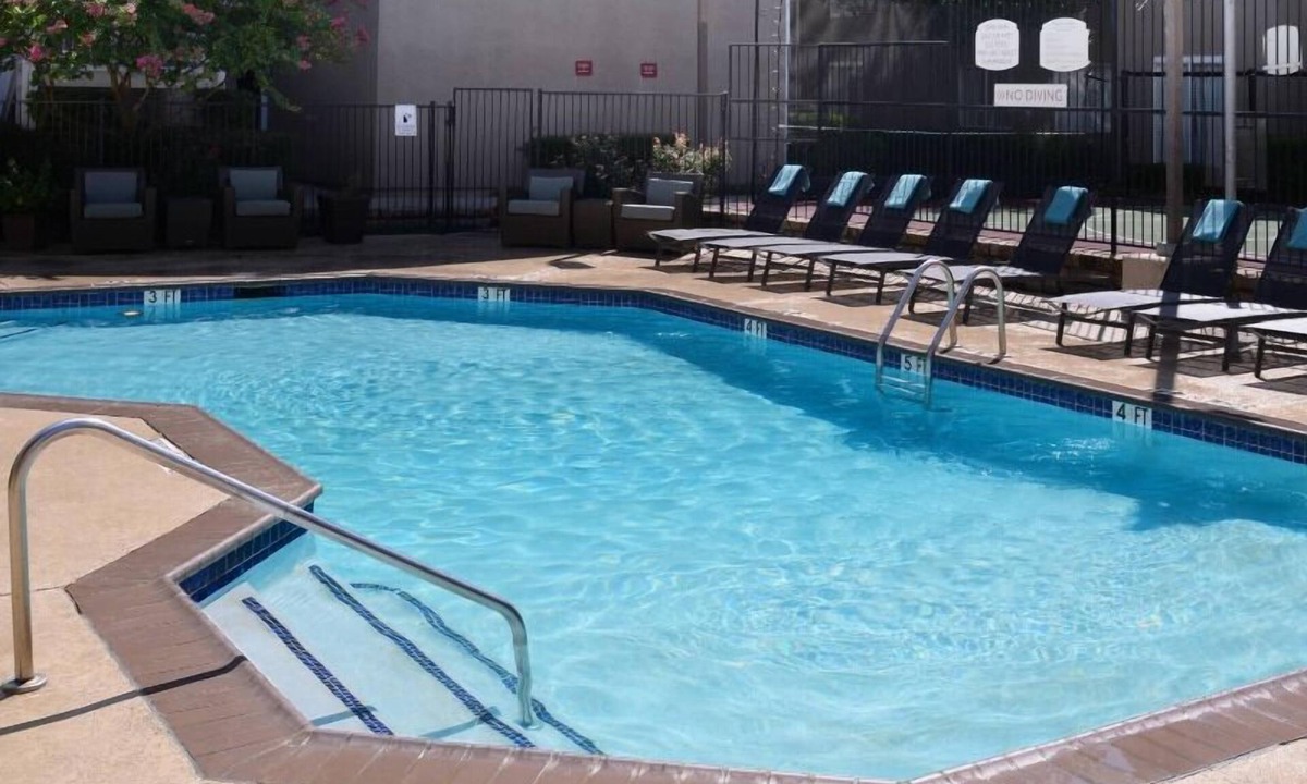 Dallas Apartment | Relax and Recharge! 3 Comfortable Units, Parking, Onsite Swimming Pool