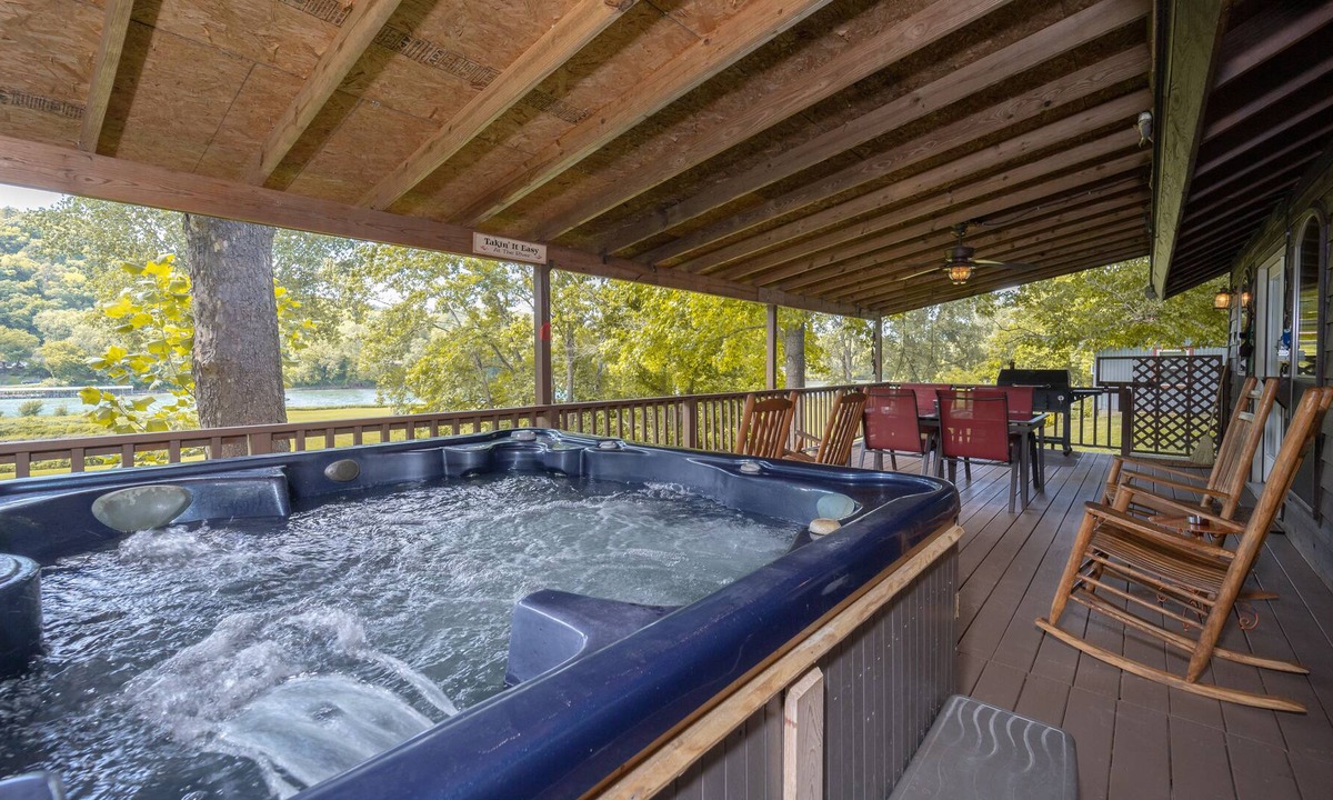 Boswell Cabin | Riverfront Cabin with Bluff Views Covered Deck and Hot Tub