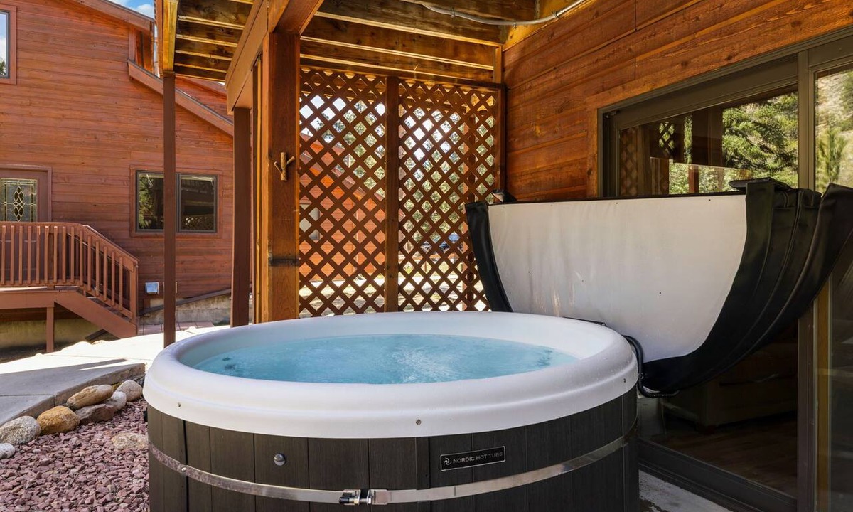 Fall River Estates Condo | Riverfront Hideaway Private Hot Tub