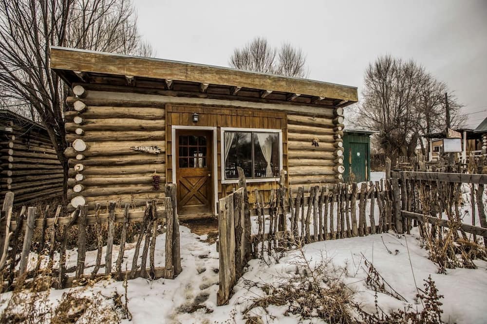San Cristobal Cabin | Rustic Log Cabin on Eco-Friendly Farm near Taos, New Mexico