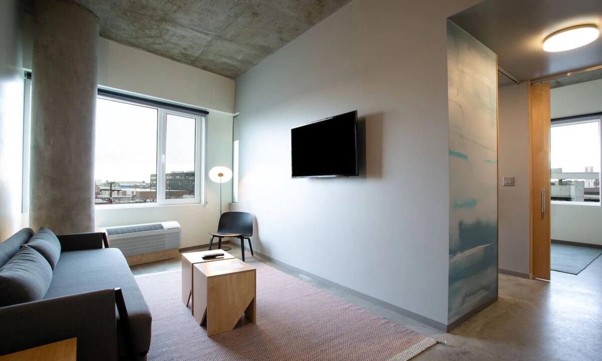 River North Art District Hotel | Spacious Suite with Stunning Market Views, Chic Decor, and Modern Amenities