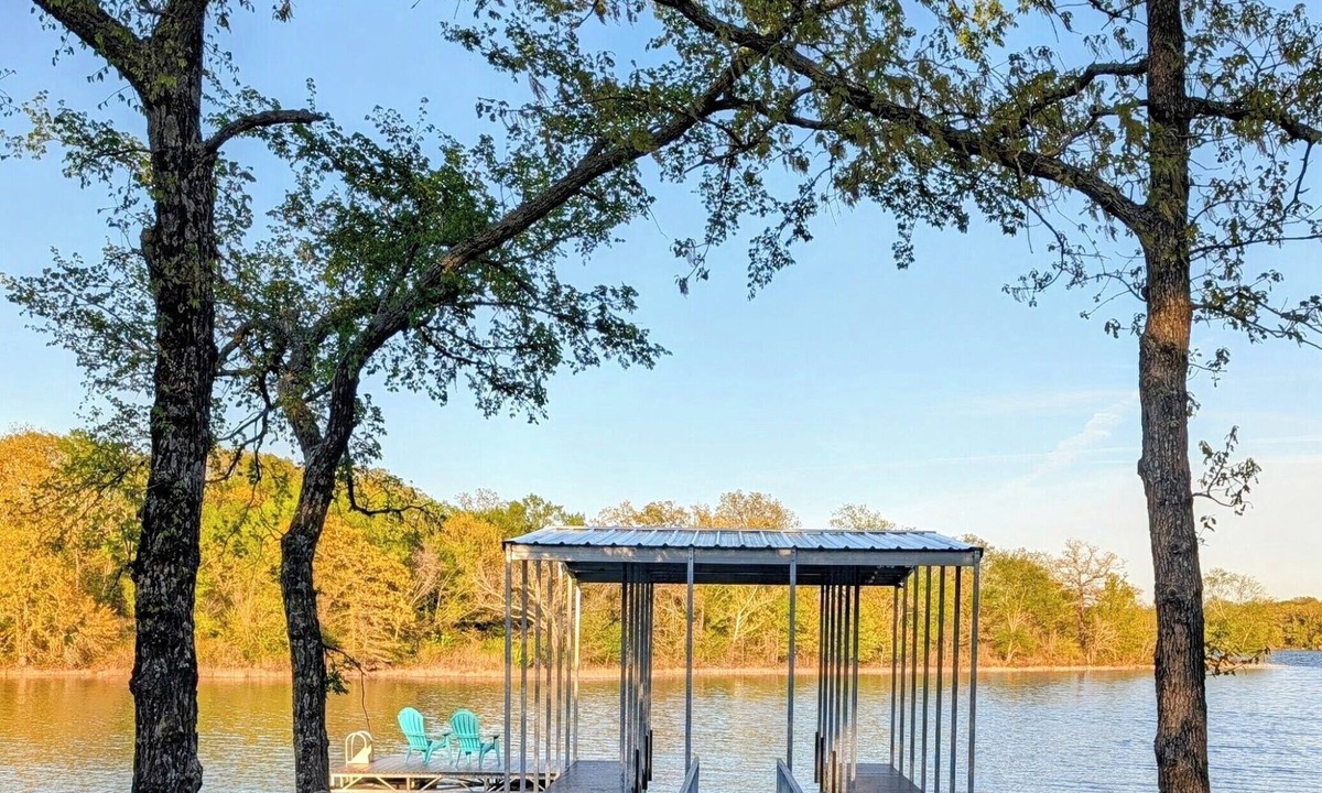 Okmulgee House | The Lake House is a Private Lake Escape with Covered Dock+Swim Platform+Fire Pit