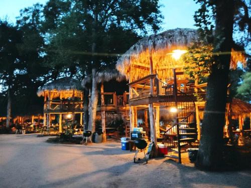 Prairie Lea House | Tranquil Log Cabin by the San Marcos River - A Relaxing Glamping Getaway near Kingsbury, Texas