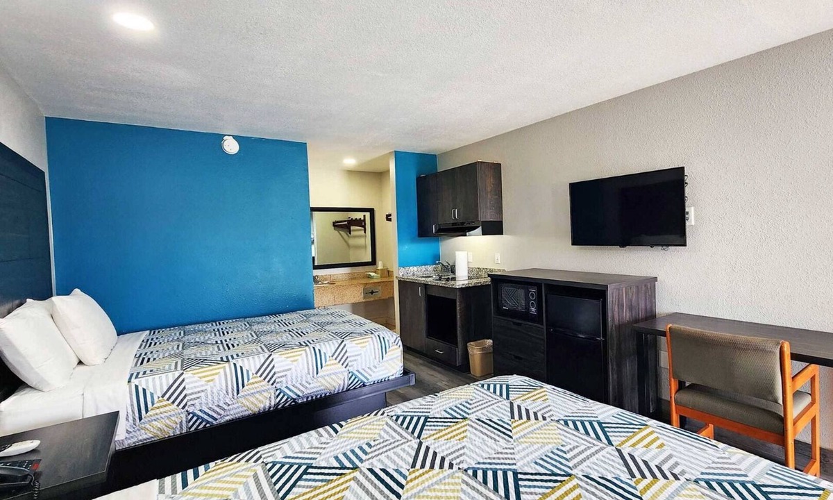 Wharton Hotel | Two Queen Beds Kitchenette Non-Smoking Room at Scottish Inns and Suites!