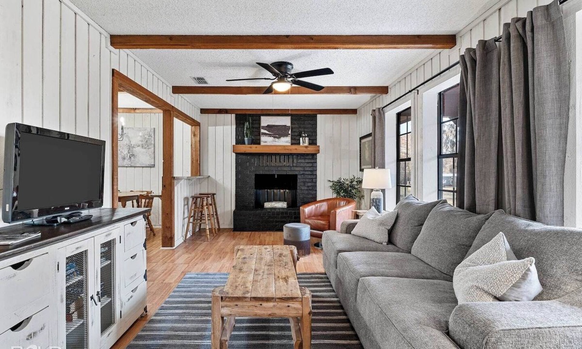 Uncertain Cabin | Unwind in a cozy rustic-modern cabin with a front porch, private dock access, firepit nights, outdoor dining, and cornhole. RV site next to house.