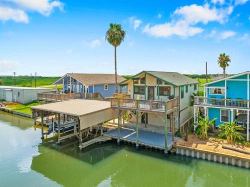 Freeport House | Waterfront beach house with the ultimate game room and two docks
