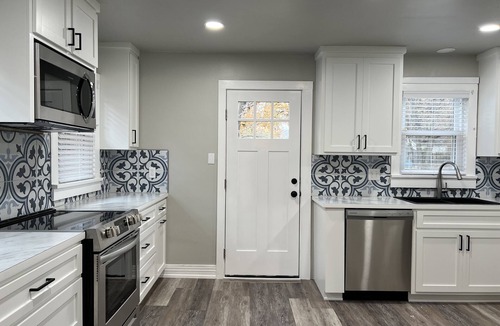 Muskogee House | 1940's remodeled bungalow in quiet neighborhood.