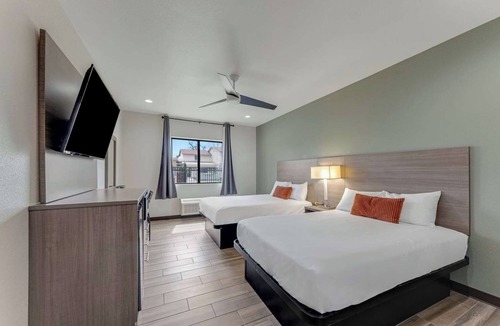 Eastside Promise Neighborhood Hotel | 2 Spacious Room w/Complimentary Breakfast Ideal for Group Business Trip