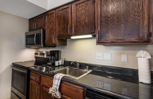 Biggs Field Hotel | 2 Spacious Suites – Pool, Free Breakfast & Full Kitchen