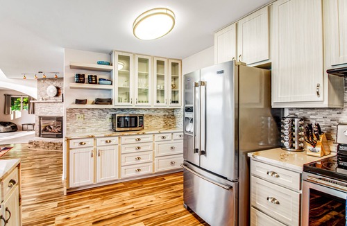 Diamond Point Apartment | 2-story inviting home with water & mountain views, deck, & gas fireplace