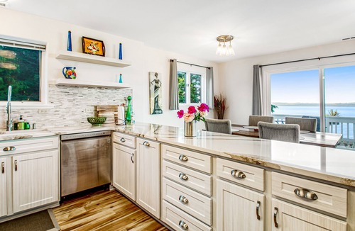 Diamond Point Apartment | 2-story inviting home with water & mountain views, deck, & gas fireplace