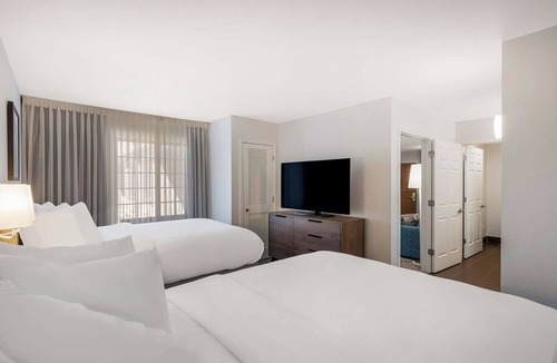 Acres Green Hotel | 3 Family Ready Suites with Living Space Near Park Meadows | Outdoor Pool