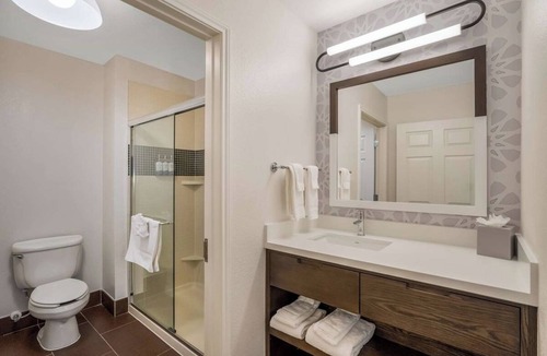 Acres Green Hotel | 3 Family Ready Suites with Living Space Near Park Meadows | Outdoor Pool
