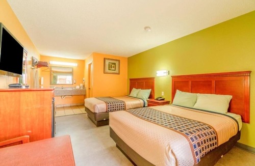 Denver City Hotel | 3-Room Budget Stay w/2 Full Beds & Prime Location in Denver City