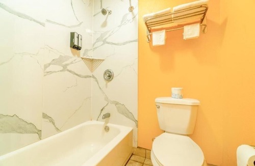 Denver City Hotel | 3-Room Budget Stay w/2 Full Beds & Prime Location in Denver City
