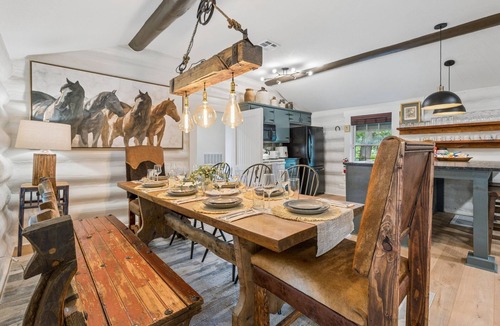 Central Oklahoma City Cabin | 3BR log cabin west OKC — fenced yard, grill, patio. Full kitchen. Sleeps 10. #MW