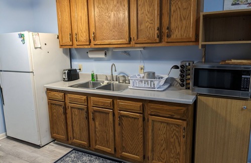 Omaha House | 4 minutes to zoo & 10 minutes to downtown! 2 bedroom, 3 bed home w/patio & yard