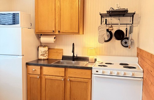Poynette House | #4 Riverfront Lodging. Beach, Boat, Fish, Hike.