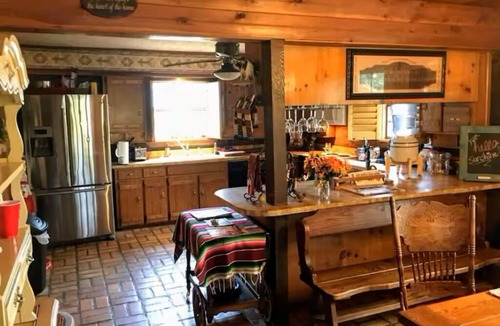 Cleburne Cabin | 4B/4B Log Cabin Guesthouse includes an Old Western Town, Saloon & Firepit!