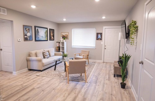 Shawnee Apartment | A charming bedroom with a king bed in quiet Shawnee neighborhood near highways.