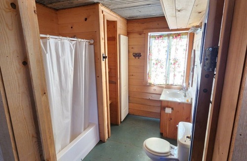 Blue Cabin | A peaceful setting for guests to relax and unwind. 18 Guest, 2 floor cabin
