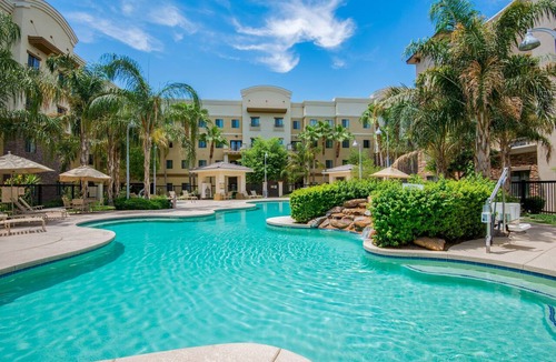 Glendale Sports and Entertainment District Apartment | Accessible 2BR Suite w/Pool + Daily Breakfast