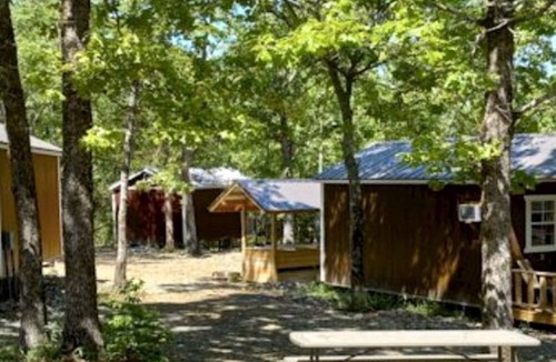Board Camp Cabin | Accessible Cabin Escape with Cozy Woodland Charm in Mena, Arkansas