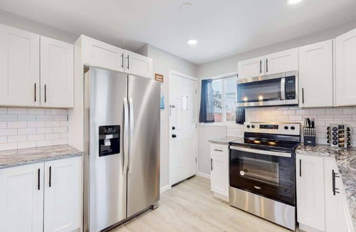 Twin Lakes House | Awesome Two Bedroom Family Upper Unit in Denver