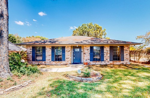 La Porte House | Bay Harbor Beauty | House in La Porte with yard and fireplace - close to beaches