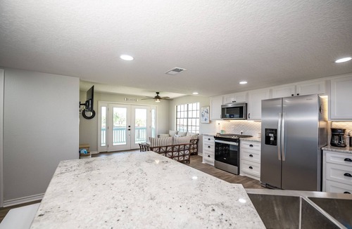 Cedar Lane House | Beautiful Home on Caney Creek w/Fishing Pier, Hot Tub, Fire Pit
