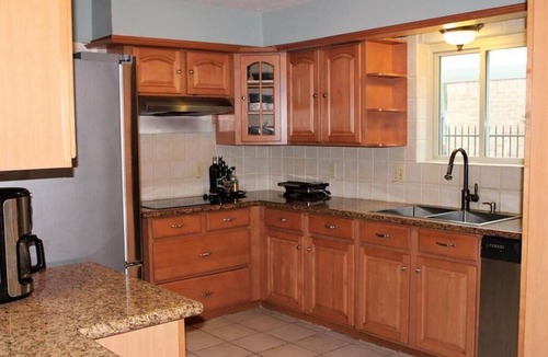 Briarforest House | Beautiful Three Bedroom Home with Scenic Backyard