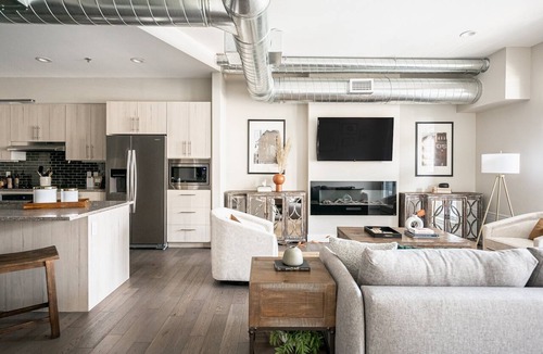 River North Art District Condo | Bright & Breezy | RiNo Loft with Custom Street Art | Dog-Friendly