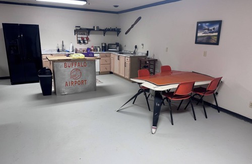 Amarillo House | Buffalo airport Fly Inn. 2 bedroom inside a airplane hangar!