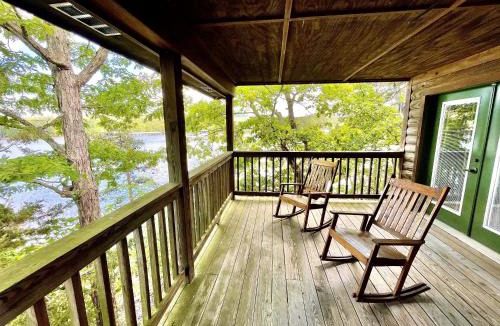 Mount Ida House | C17 - Lake view three bedroom, three bath log-sided cottage with private hot tub overlooking Lake Ouachita