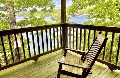 Mount Ida House | C17 - Lake view three bedroom, three bath log-sided cottage with private hot tub overlooking Lake Ouachita