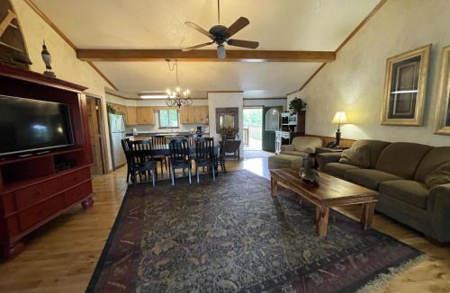 Mount Ida House | C17 - Lake view three bedroom, three bath log-sided cottage with private hot tub overlooking Lake Ouachita