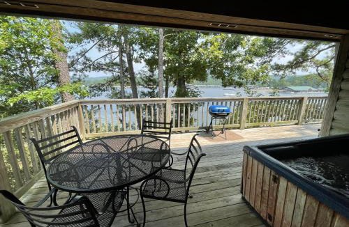 Mount Ida House | C18 - Lake view two bedroom, two bath loft, log-sided cottage with private hot tub overlooking Lake Ouachita