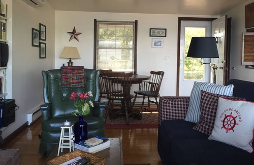 Mashpee Neck House | Cape Cod Waterfront Vacation Home dock and 2 kayaks: