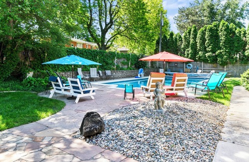 West Omaha House | Central Omaha Pool with Spa Oasis + 3 Living Rooms